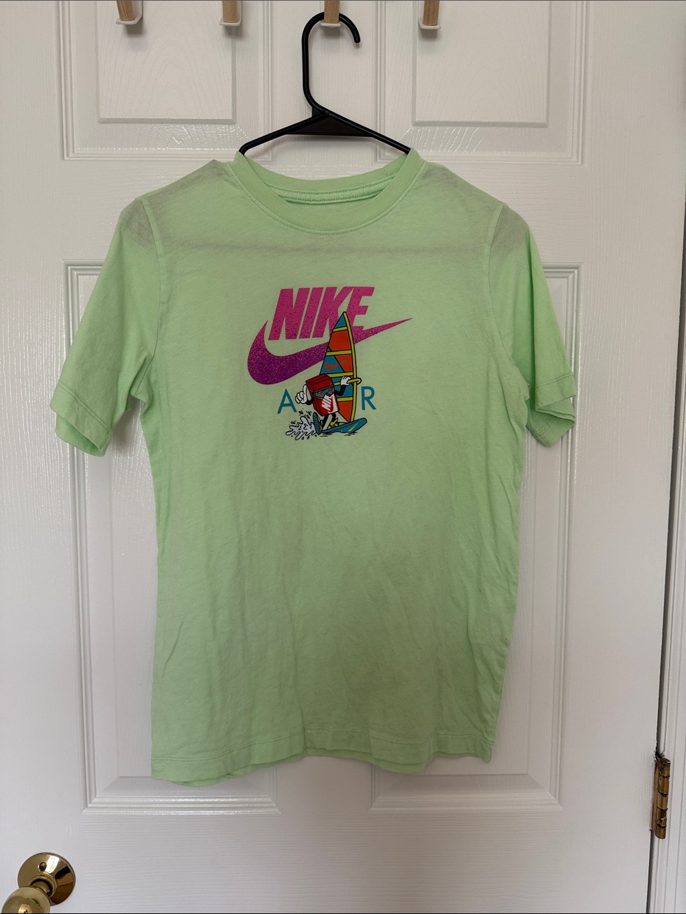 Nike Mint Green Kids' Graphic Tee with Pink Logo and Surf Art